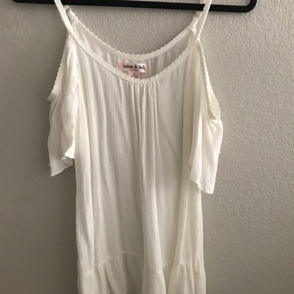 White ruffle shirt